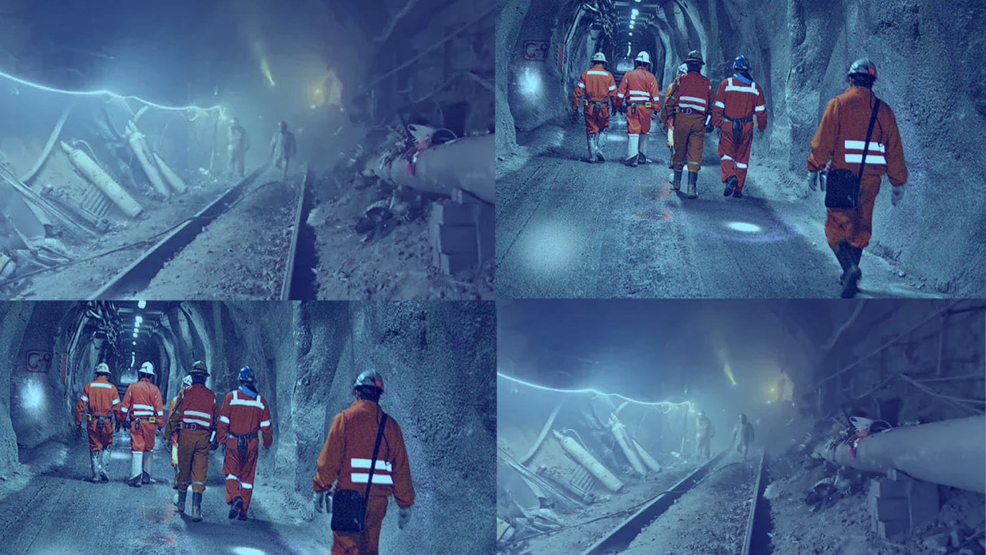 Mineros vestidos con trajes naranjas y cascos de seguridad caminando por un túnel subterráneo en una mina, con paredes rocosas y equipo minero visible, en un ambiente oscuro y con luces de trabajo que iluminan parcialmente el espacio.